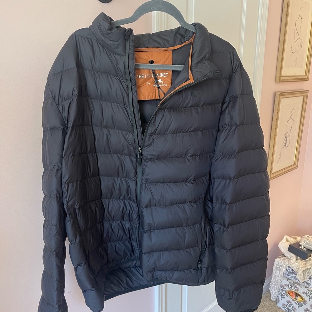 The North Face Black Jacket with Orange Interior Trim